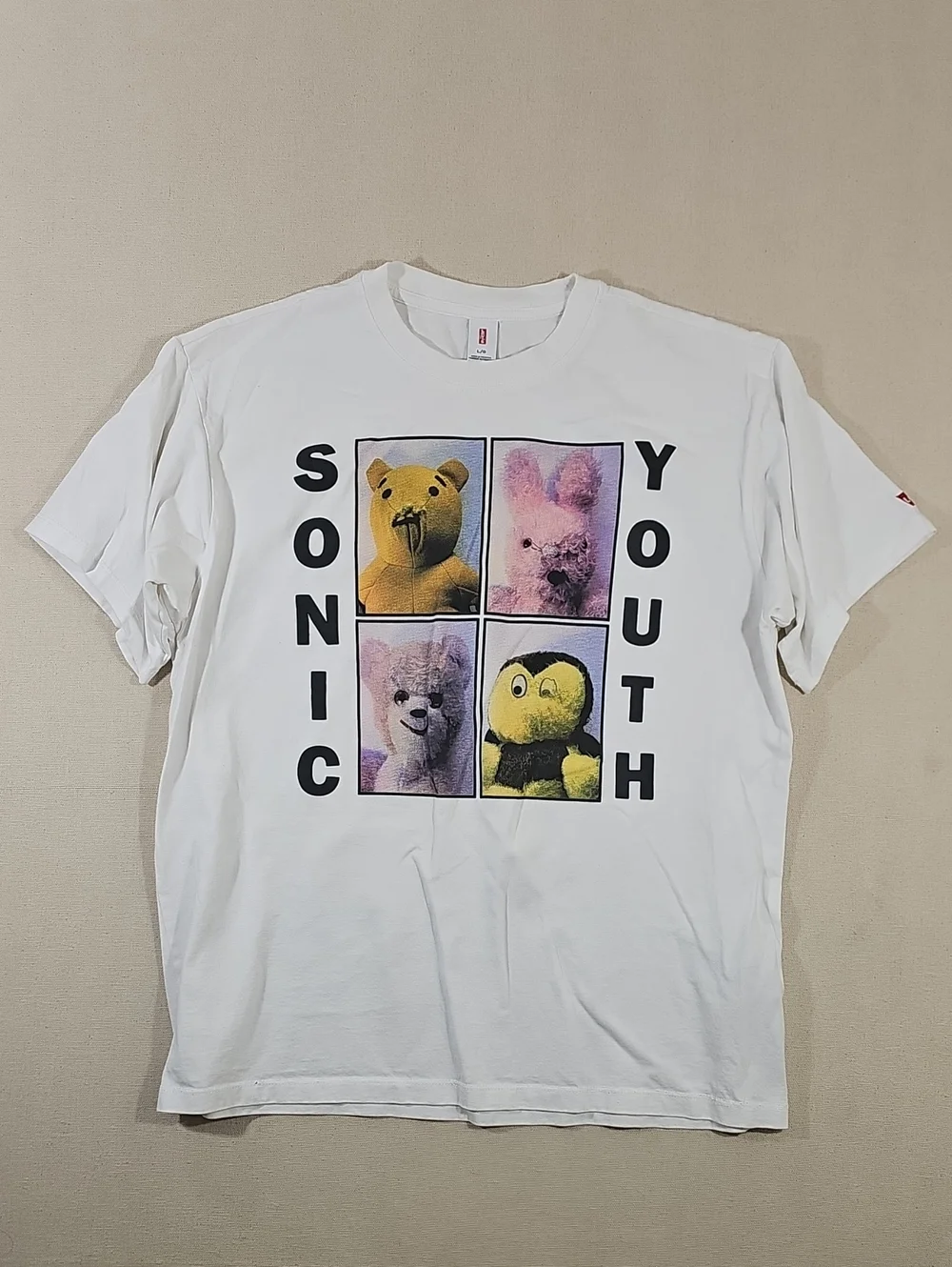 Levi's White Sonic Youth Graphic Tee with Yellow and Purple Characters